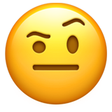 Hymyilevä kasvo kohotetulla kulmakarvalla