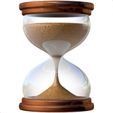 Tiimalasi, jossa virtaava hiekka